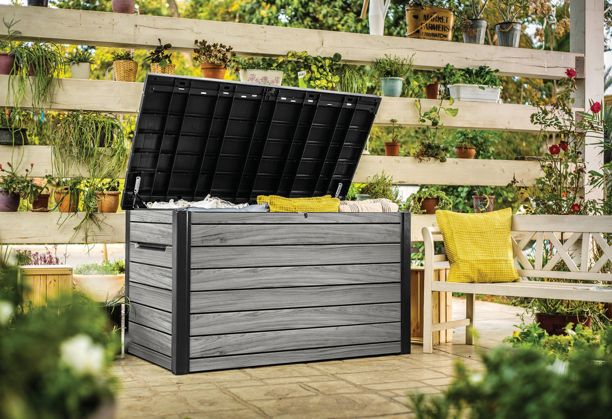 Auflagenbox 870 l aus Kunststoff in Holzoptik mit Belüftung Gasdruckfedern abschließbar 147 x 83 x 86 cm