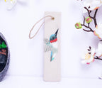 Handbesticktes Leinen-Lesezeichen mit Vogel- und Gänseblümchen-Motiv